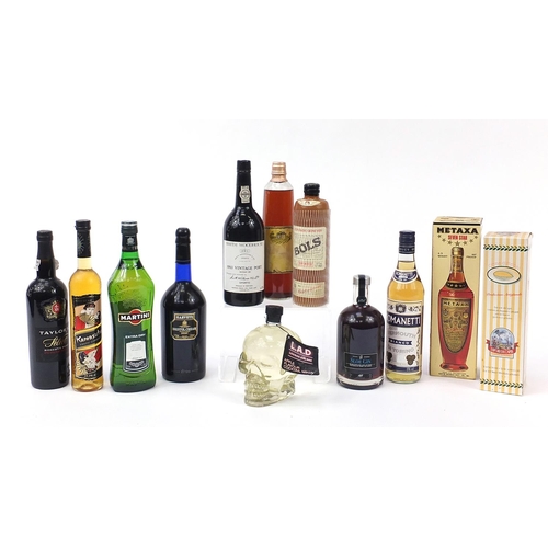 1094 - Twelve bottles of alcohol including Martini, Smith Woodhouse 1983 vintage port, Metaxa Seven Stars a... 