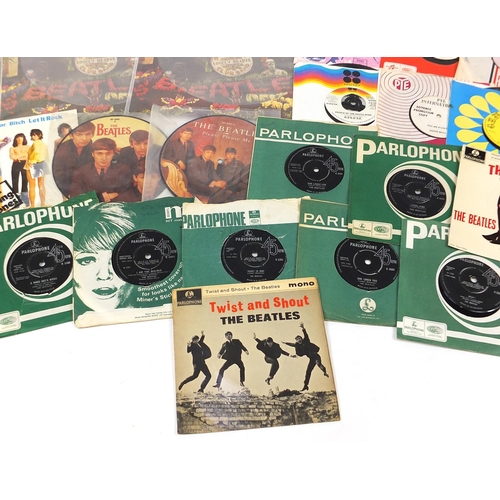 2618 - Vinyl LP's and 45rpm records including Sargent Pepper's Lonely Hearts Club Band, David Bowie and The... 