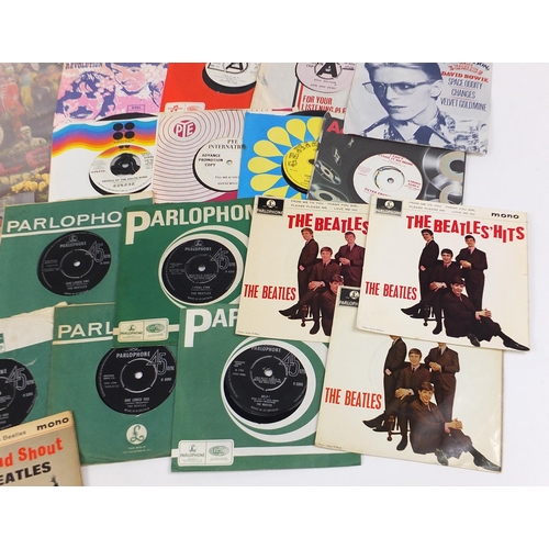 2618 - Vinyl LP's and 45rpm records including Sargent Pepper's Lonely Hearts Club Band, David Bowie and The... 