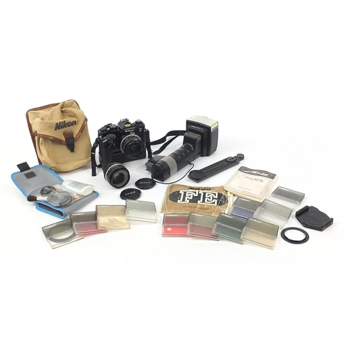 686 - Nikon FE camera, lenses and accessories including filters