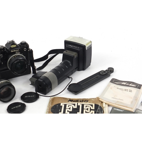 686 - Nikon FE camera, lenses and accessories including filters