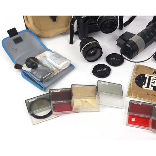 686 - Nikon FE camera, lenses and accessories including filters