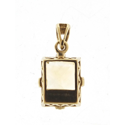 421 - 9ct gold citrine pendant, 1.6cm high, 1.5g