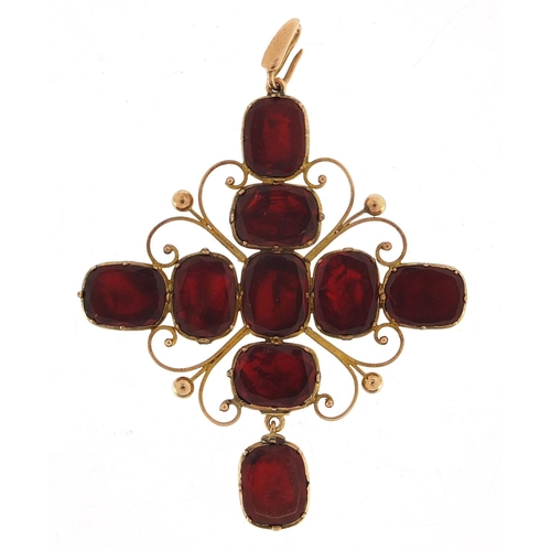 34 - Large antique gold coloured metal red stone pendant, possibly garnet, 7cm high, 11.5g