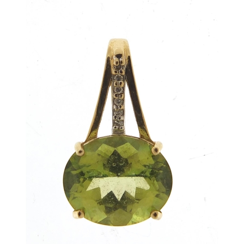 57 - 9ct gold kiwi topaz and diamond pendant, 2cm high, 3.0g
