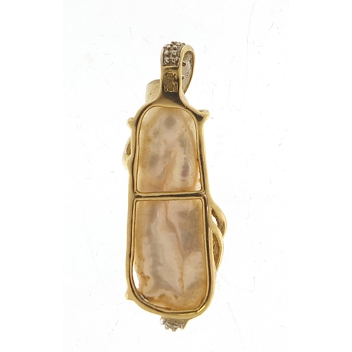 124 - 9ct gold mother of pearl and diamond pendant, 3cm high, 3.0g