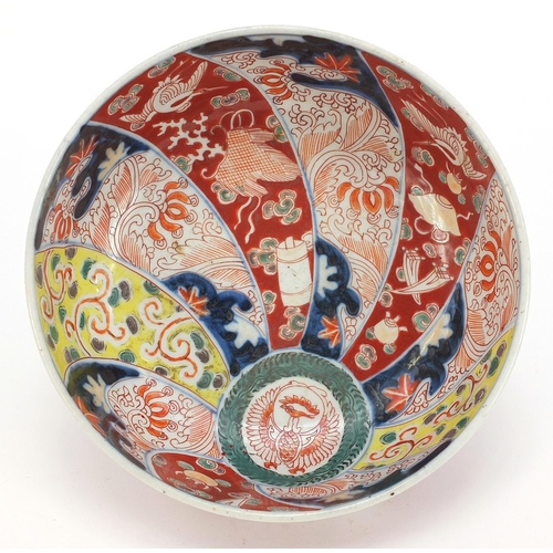 283 - Japanese Imari comprising a pair of chargers hand painted with flowers and landscapes and a bowl, th... 