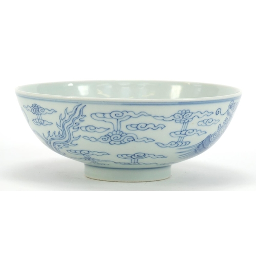 105 - Good Chinese blue and white porcelain bowl hand painted with phoenixes amongst clouds, six figure ch... 