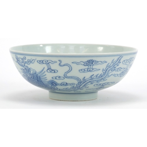 105 - Good Chinese blue and white porcelain bowl hand painted with phoenixes amongst clouds, six figure ch... 