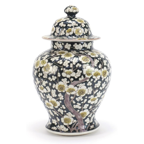 181 - Chinese porcelain baluster vase and cover hand painted with prunus flowers, 27.5cm high