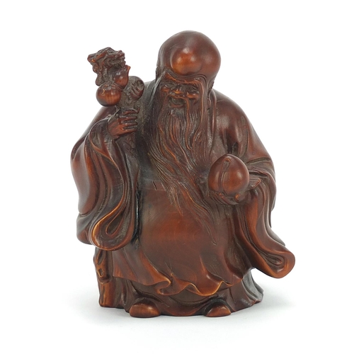 480 - Good Chinese boxwood carving of Shao Lau holding a staff with gourd and peach, 10cm high