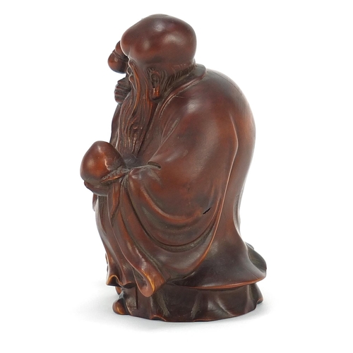 480 - Good Chinese boxwood carving of Shao Lau holding a staff with gourd and peach, 10cm high