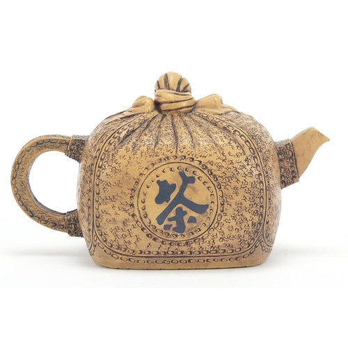 191 - Chinese Yixing terracotta sack design teapot, impressed character marks to the base, 17.5cm in lengt... 