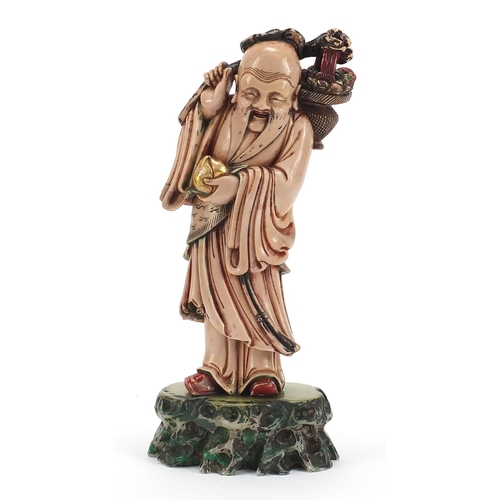 113 - Large Chinese pink soapstone carving of Shou Lao holding a basket and peach, 30cm high