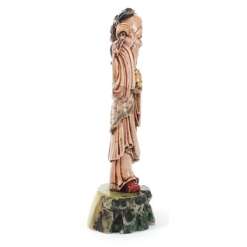 113 - Large Chinese pink soapstone carving of Shou Lao holding a basket and peach, 30cm high