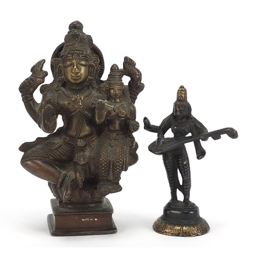 397 - Two Indian patinated bronze votive figures, the largest 16.5cm high