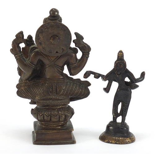 397 - Two Indian patinated bronze votive figures, the largest 16.5cm high