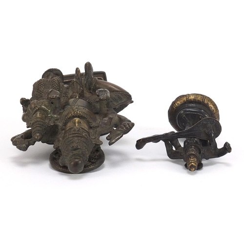 397 - Two Indian patinated bronze votive figures, the largest 16.5cm high