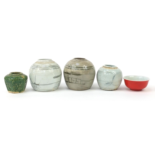 999 - Chinese porcelain including four ginger jars and a sang de boeuf bowl, the largest 15.5cm high