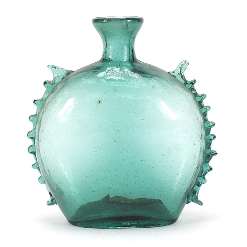 83 - Antique green glass bottle shaped vase with applied frilled edges, 20cm high