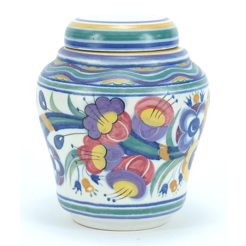 315 - Poole Carter, Stabler & Adams baluster jar and cover, hand painted with flowers, 18cm high