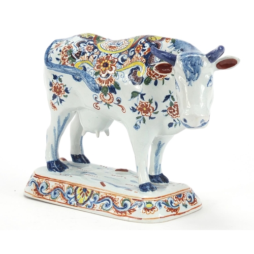 78 - ** WITHDRAWN ** Antique Dutch Delft cow hand painted with flowers, 22cm in length