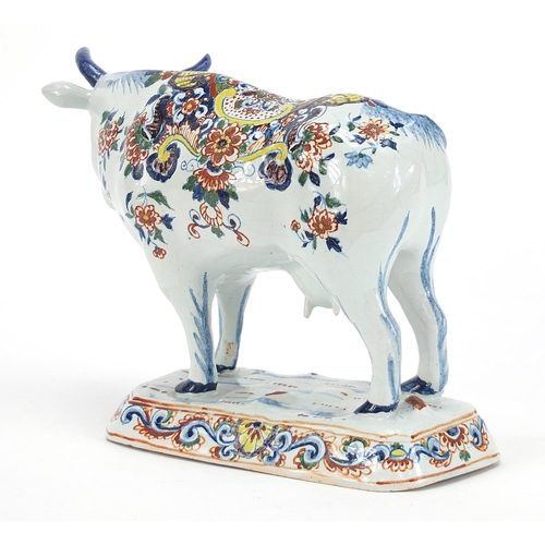 78 - ** WITHDRAWN ** Antique Dutch Delft cow hand painted with flowers, 22cm in length