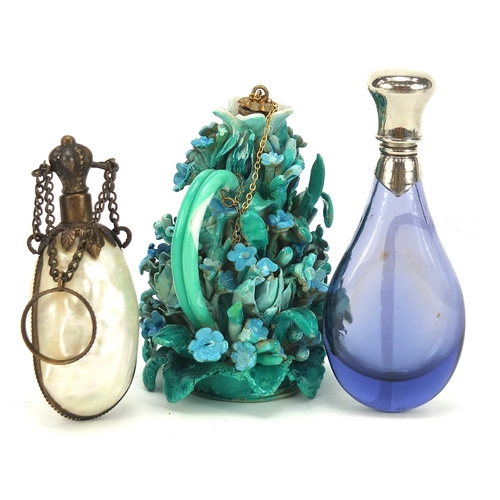 781 - Three scent bottles including a floral encrusted porcelain example, the largest 9.5cm high