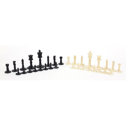 138 - Carved bone half stained chess set, the largest pieces each 5.5cm high