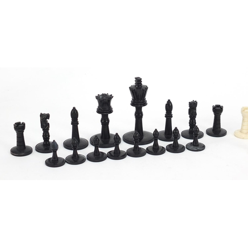 138 - Carved bone half stained chess set, the largest pieces each 5.5cm high