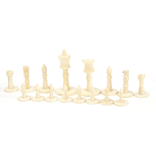 138 - Carved bone half stained chess set, the largest pieces each 5.5cm high