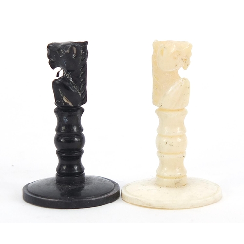 138 - Carved bone half stained chess set, the largest pieces each 5.5cm high