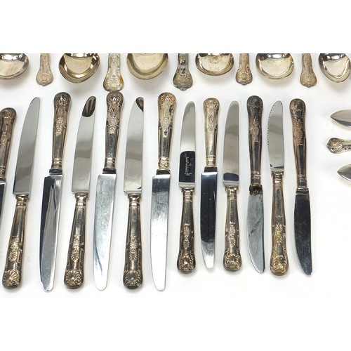 1084 - Collection of silver plated cutlery including some retailed by Harrods