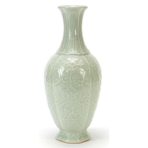 925 - Chinese porcelain quatrefoil vase having a celadon glaze, decorated in relief with bats and fruit, f... 