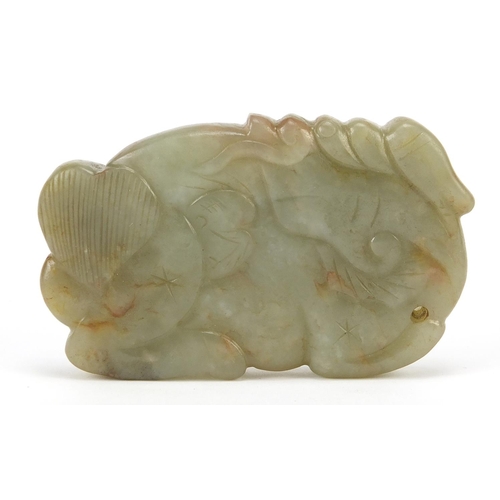 832 - Chinese green and russet jade carving of a mythical animal, 9cm wide