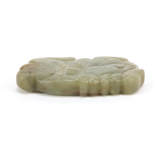 832 - Chinese green and russet jade carving of a mythical animal, 9cm wide