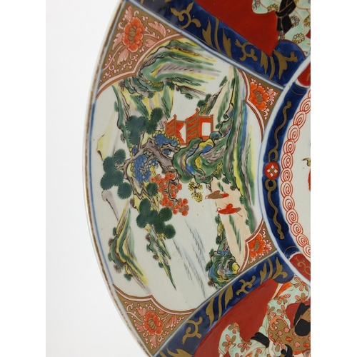 1002 - Japanese Imari porcelain charger hand painted with panels of figures and landscapes, impressed and p... 