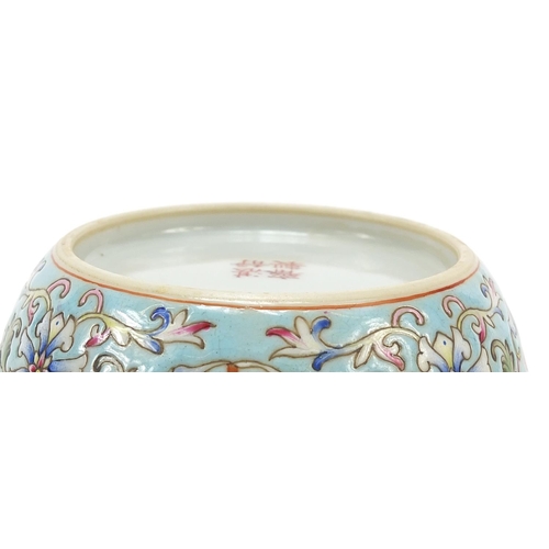 716 - Chinese porcelain turquoise ground bowl, finely enamelled in the famille rose palette with flower he... 