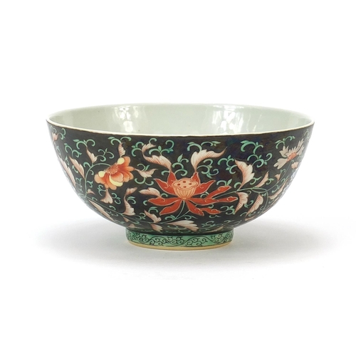 926 - Chinese porcelain bowl hand painted in the famille noir palette with flower heads amongst scrolling ... 