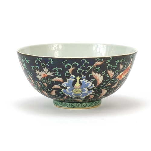 926 - Chinese porcelain bowl hand painted in the famille noir palette with flower heads amongst scrolling ... 