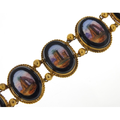 695 - Antique Italian gilt metal and black onyx, bracelet painted with ruins, 18cm in length, 36.8g