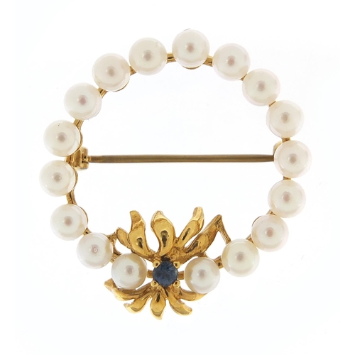 171 - 9ct gold pearl and sapphire brooch, 3cm in diameter, 5.2g