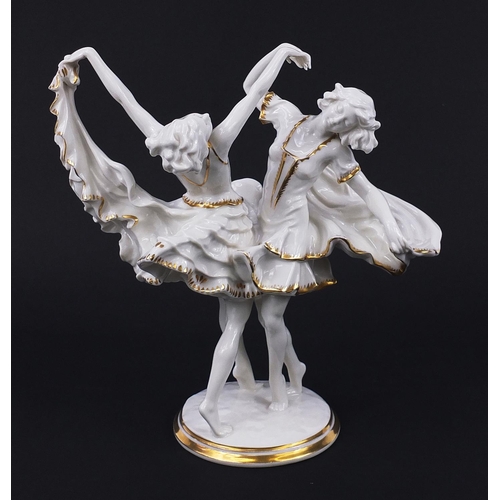 317 - Karl Tutter for Hutschenreuther, German gilded porcelain figure of two dancers, 28.5cm high