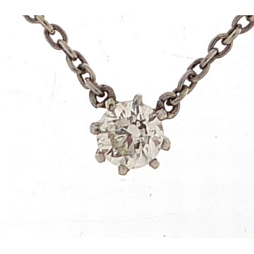 427 - Solitaire diamond on a Victorian silver pendant and necklace, the diamond approximately 4mm in diame... 