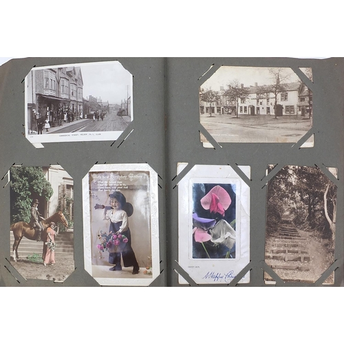 442 - Victorian and later topographical, social history and greetings postcards arranged in an album, some... 