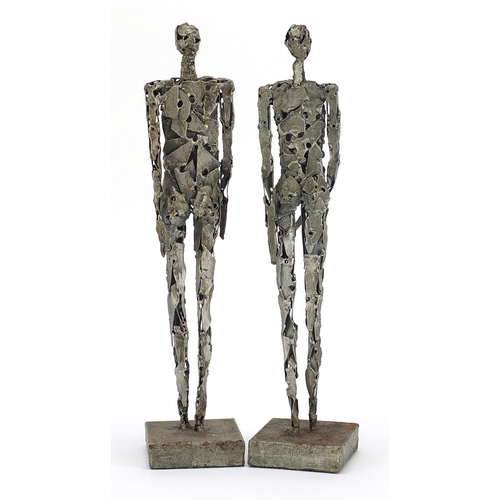 325 - Two Modernist silvered metal sculptures of a nude male and female in the style of Bernard Moore, eac... 