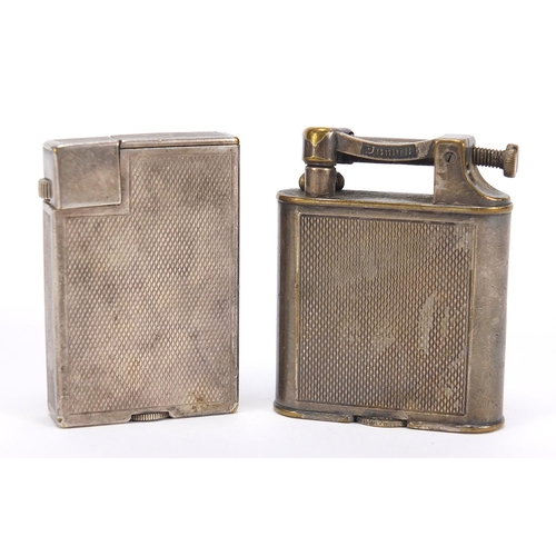 750 - Two Dunhill silver plated pocket lighters with engine turned decoration, the largest 5cm high