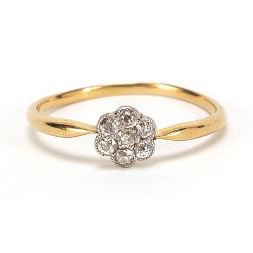 811 - 18ct gold diamond flower head ring, size R/S, 1.8g