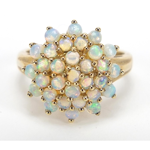 809 - 9ct gold opal four tier cluster ring, size P, 3.7g