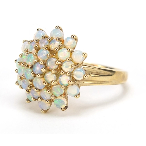 809 - 9ct gold opal four tier cluster ring, size P, 3.7g